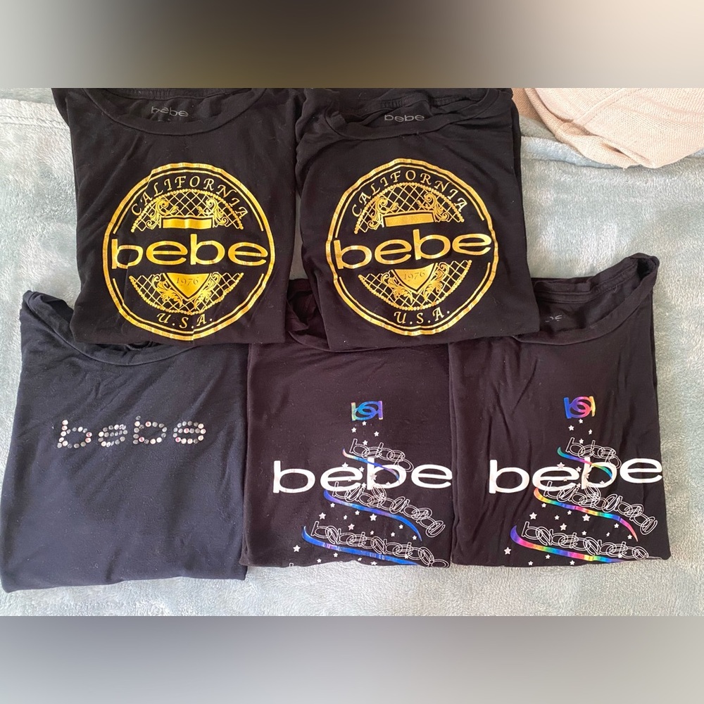 Bebe women’s Black and Gold Graphic Tees